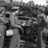 Nursing sisters of the Royal Canadian Army Medical Corps (R.C.A.M.C.)  examining the wreckage of a German tank in the Normandy bridgehead, France, 17 July 1944.