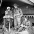 Unidentified personnel of the Canadian Armoured Corps (C.A.C.) using wireless signal information to plot enemy movements in the Normandy beachhead, France, 6 June 1944.