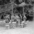 General Sir Bernard Montgomery (eighth from left) talking with Lieutenant-General Guy Simonds (ninth from left) and other senior officers of the 2nd Canadian Corps at Corps Headquarters in the Normandy bridgehead, France, 20 July 1944.