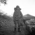 Lieut. W.H. Langdon, carrying full kit, joins up with his unit, the First Special Service Force north of Venafro, Italy, January 1944.