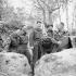 Lieutenant-Colonel P.C. Klaehn (centre), Commanding Officer of The Cameron Highlanders of Ottawa (M.G.), holding a map session with officers of the regiment near Caen, France, 15 July 1944.