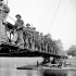 Lieutenant-Colonel Charles Petch, Commanding Officer, leading The North Nova Scotia Highlanders across London Bridge, a Bailey bridge across the Odon River south of Caen, France, 18 July 1944.