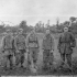 Soldiers of the German 12th S.S. Division in a temporary prisoner-of-war cage in Normandy, France, ca. 7-8 July 1944.