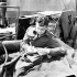 Company Sergeant-Major D.D. Perkins of the 9th Canadian Infantry Brigade writing a letter aboard a Landing Ship Tank (LST) en route to the Normandy beachhead, France, June 1944.