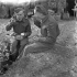Sappers F.R. Fuller and Harry Rennie of the Royal Canadian Engineers (R.C.E.) eating dinner, Castel Frentano, Italy, 20 December 1943.