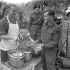 Sappers of the Royal Canadian Engineers (R.C.E.) having dinner, Castel Frentano, Italy, 20 December 1943.