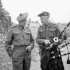 Regimental Sergeant-Major L.D. Burnet and Pipe Major Samuel Cott, both of The Cameron Highlanders of Ottawa (M.G.), near Caen, France, 15 July 1944.