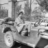 Nursing Sister Constance Browne of the Royal Canadian Army Medical Corps (R.C.A.M.C.) sitting in a jeep, Leonforte, Italy, 7 August 1943.