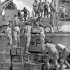 Commandos loading ammunition aboard a Landing Craft Assault (LCA) of H.M.C.S. PRINCE DAVID near Taranto, Italy, 13 September 1944.