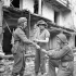 Personnel of the Royal Canadian Engineers (R.C.E.) placing demolition charges, Caen, France, 10 July 1944.