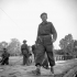 Brigadier D.G. Cunningham, Commander of the 9th Canadian Infantry Brigade, crossing the Orne River on a Bailey bridge built by the Royal Canadian Engineers (R.C.E.) en route to Caen, France, 18 July 1944.