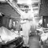 Hospital orderly E. Hartz checks the condition of Private F.E. Arden in a ward aboard the hospital ship LADY NELSON, Naples, Italy, 29 January 1944.
