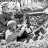 Corporal R. Hill and Private A.D. Hiebert, Saskatoon Light Infantry (M.G.), manning a Vickers machine gun, Riccione, Italy, 1944.