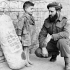 Private J.S.P. Bowen, Princess Patricia's Canadian Light Infantry (P.P.C.L.I.), saying goodbye to a young friend before leaving Italy for a thirty-day Christmas leave in Canada. Italy, 1944.