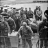 German soldiers who were captured during Operation JUBILEE, the raid on Dieppe, disembarking in England, 19 August 1941.