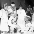 Private R.E. Pavely (lower right) of the 2nd Canadian Infantry Brigade talking with nurses and patients at a hospital in Avigliano, Italy, ca. 21-22 September 1943.