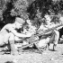 Personnel restoring a captured Italian Breda machine gun, No.1 Canadian Brigade Reinforcement Depot, near Syracuse, Italy, 11 August 1943.