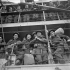 Gunners of the 7th Light Anti-Aircraft Regiment, Royal Canadian Artillery (R.C.A.), disembarking at Catania, Italy, 8 December 1943.