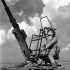 Private Everett Dewar, Saskatoon Light Infantry (M.G.) attached to the West Nova Scotia Regiment, manning an Oerlikon 20mm. anti-aircraft gun, Spinazzola, Italy, 1 October 1943.