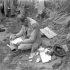 Lieutenant-Colonel Paul Bernatchez, Commanding Officer, Royal 22e Régiment, reading his mail while en route to Campobasso, Italy, October 1943.