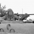 Major-General B.M. Hoffmeister, General Officer Commanding 5th Canadian Armoured Division, in the turret of the Sherman tank "Vancouver" near Castrocielo, Italy, 23 May 1944.