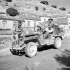 Canadian war correspondents in a jeep, Modica, Italy, 13 July 1943.