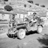 Canadian war correspondents in a jeep, Modica, Italy, 13 July 1943.