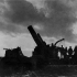"The Subjugator."  A mighty Howitzer pounding away at the Hindenburg line. Photographer Captain James Francis "Frank" Hurley.