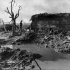 A Hun Pill-box amid surroundings characteristic of the Ypres salient. Photographer Captain James Francis "Frank" Hurley.