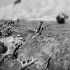 A wave of Infantry going over the top to resist a counter attack, Zonnebeke. Photographer Captain James Francis "Frank" Hurley.