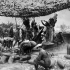 A Howitzer of the 55th Australian Siege Artillery in its lair. Photographer Captain James Francis "Frank" Hurley.